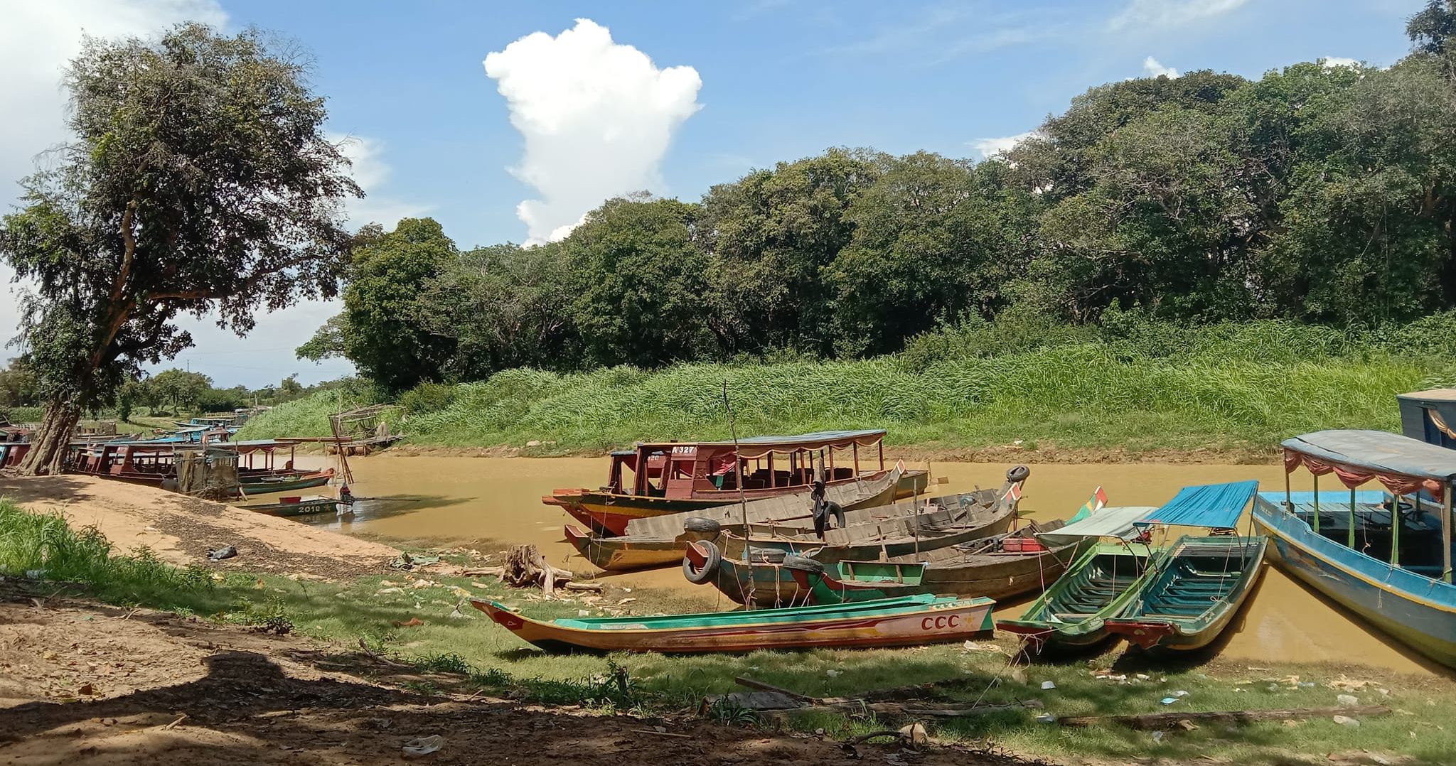 Boats on Stung Sangker River in NW Cambodia