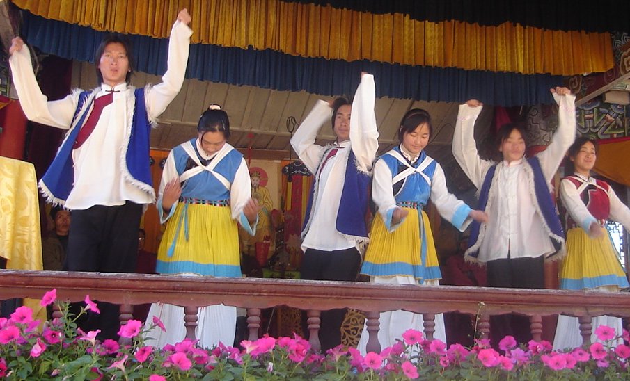 Folk Dancers in traditional costume at Dongba Cultural Village