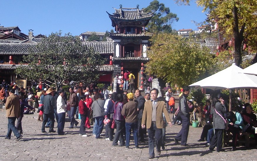 Tourists in Market Square of Lijiang Old City