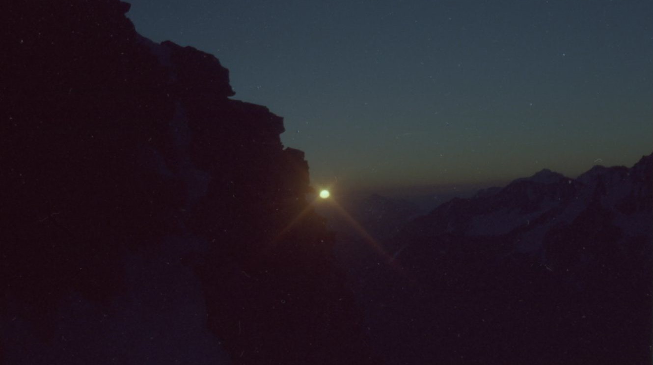 Sunrise on ascent of Weisshorn ( 4505 metres )