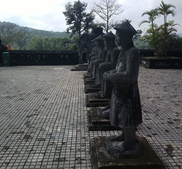 Stone guardians in courtyard of Khai Dinh Tomb at Hue