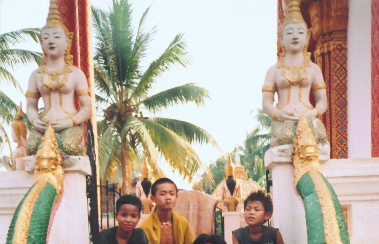 Lao Boys at a Wat ( Buddhist Temple ) in Vientiane - capital city of Laos