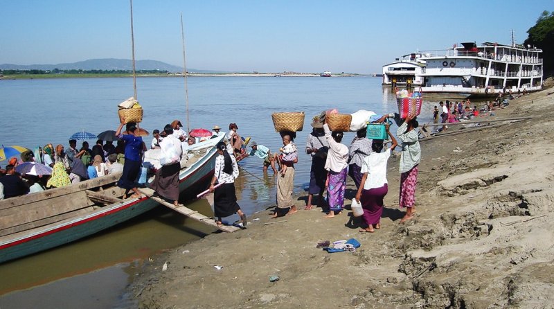 Foot Passengers boarding Ferry Boat on Irrawaddy River at Mandalay in northern Myanmar / Burma