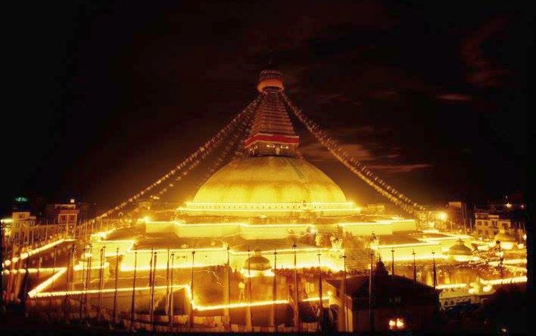 Buddhist Stupa at Bodnath ( Baudhanath ) illuminated at night in Kathmandu