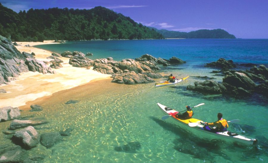 Canoeists in Abel Tasman National Park in the South Island of New Zealand