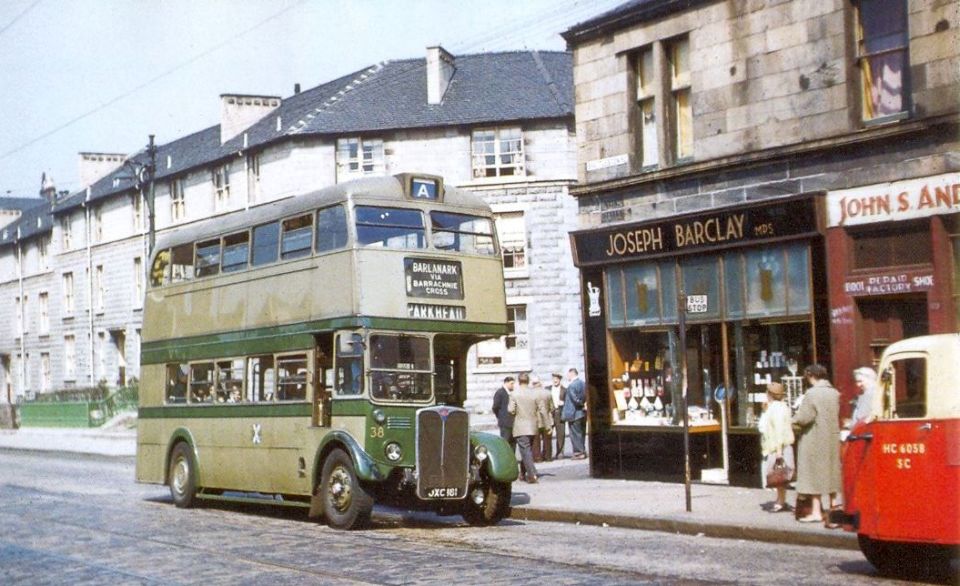 Ex-London Transport Cravens-bodied AEC Regent ( RT ) bus of Lowland Motorways in Shettleston Road in Glasgow