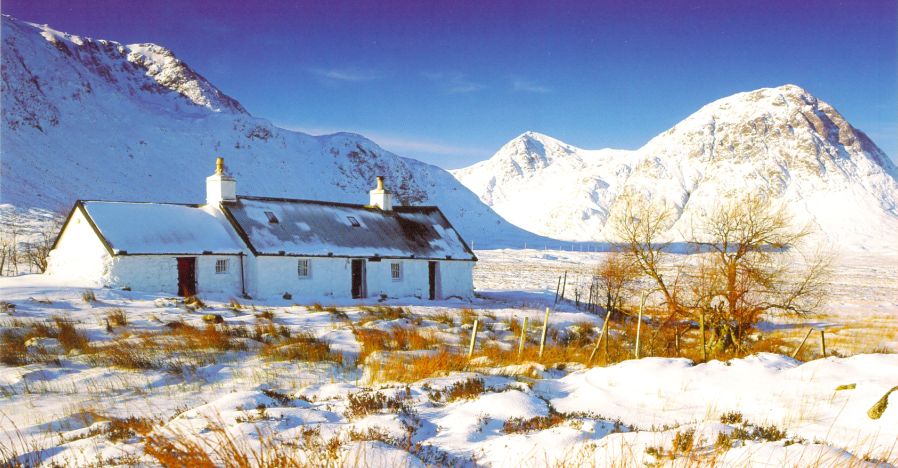 Black Rock Cottage and Buchaille Etive Mor in Glencoe snow covered in winter