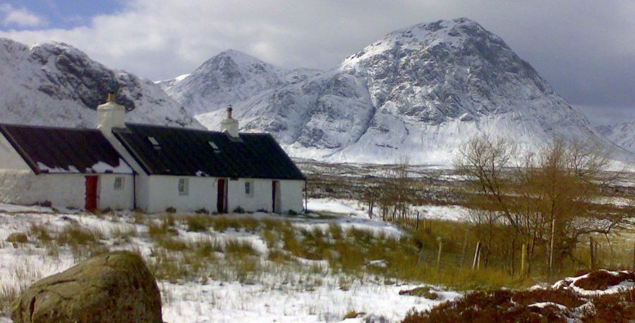 Black Rock Cottage and Buachaille Etive Mor in Glencoe snow covered in winter