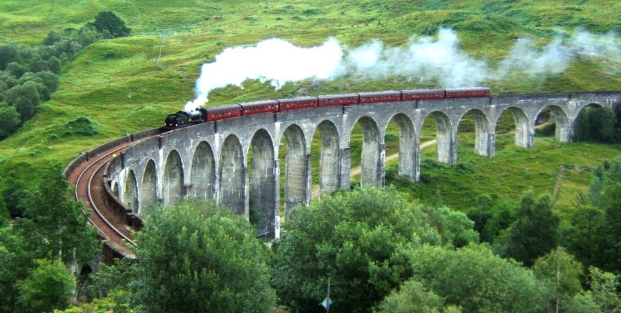 Steam Train on Glenfinnan Viaduct in Lochaber in Western Scotland
