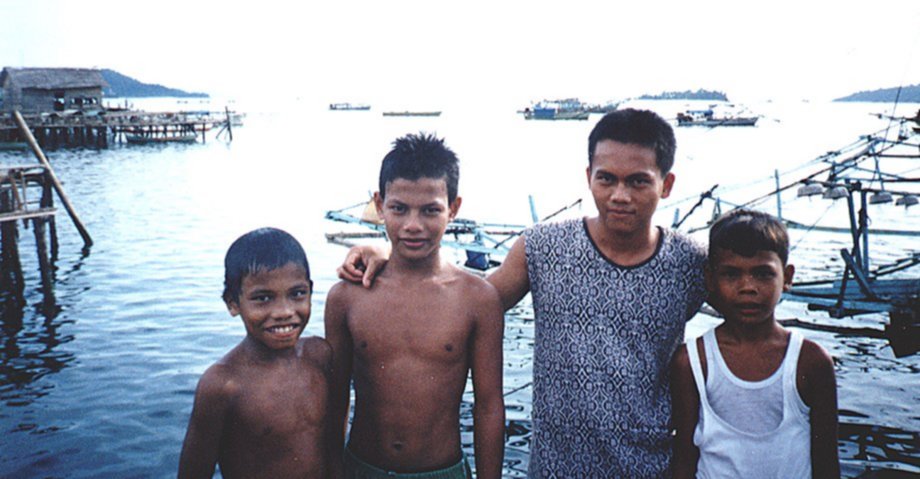 Young Indonesians at waterfront in Sibolga in Indonesia