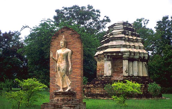 Buddha Statue and Chedi at Sukhothai Historical Park in Northern Thailand