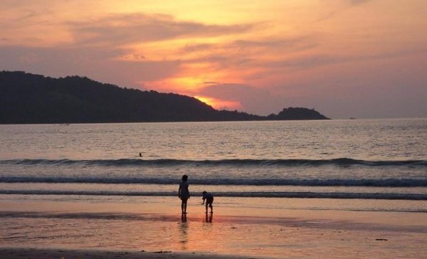Sunset at the beach on Ko Phuket in Southern Thailand