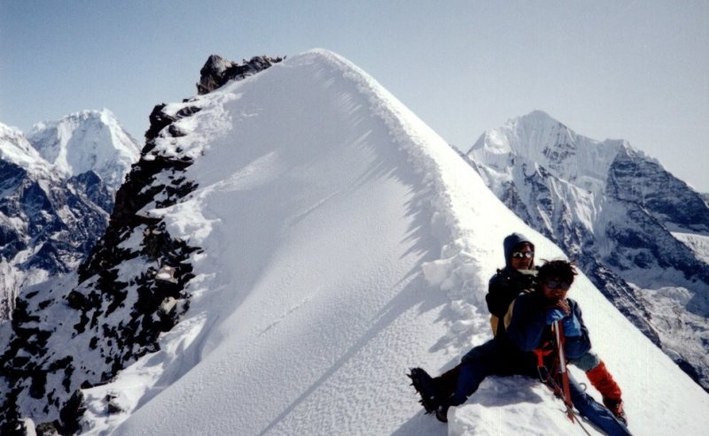 Sherpas on the summit arete of Yala Peak in the Langtang Valley