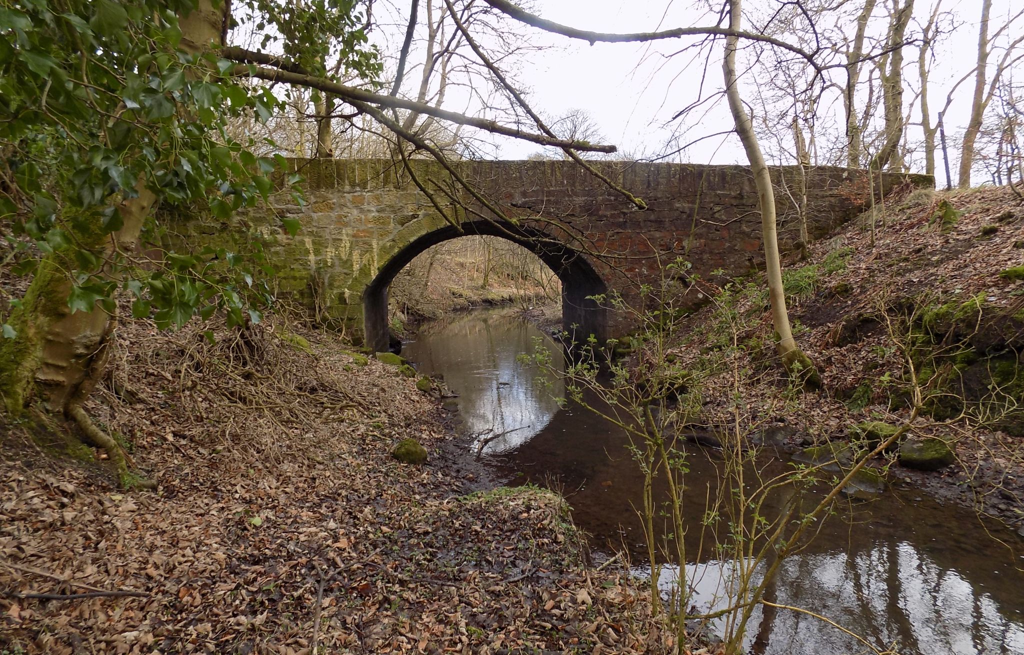 Bridge over stream from Banton Loch in Colzium Lennox estate