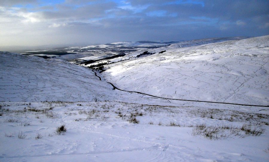 Crow Road over the snow-covered Campsie Fells in winter