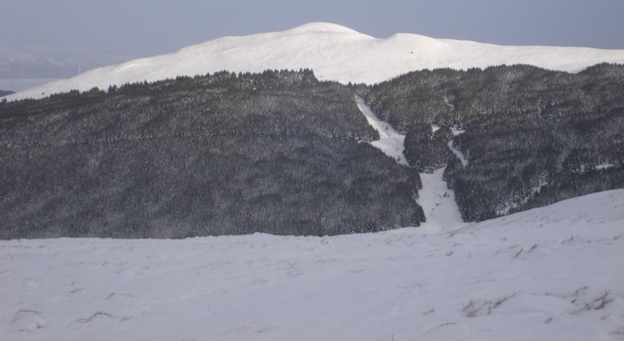 Snow-covered Meikle Bin in the Campsie Fells in winter