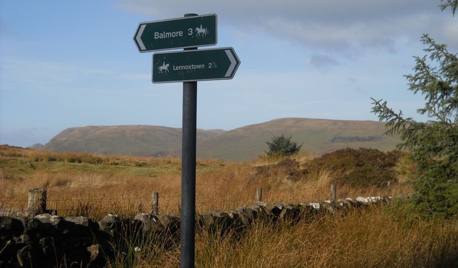 Campsie Fells beyond signpost on Blairskaith Muir