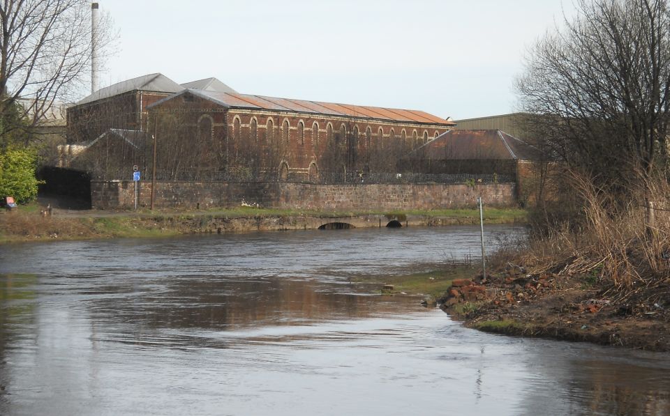 Whisky distiller warehouse at Alexandria from River Leven